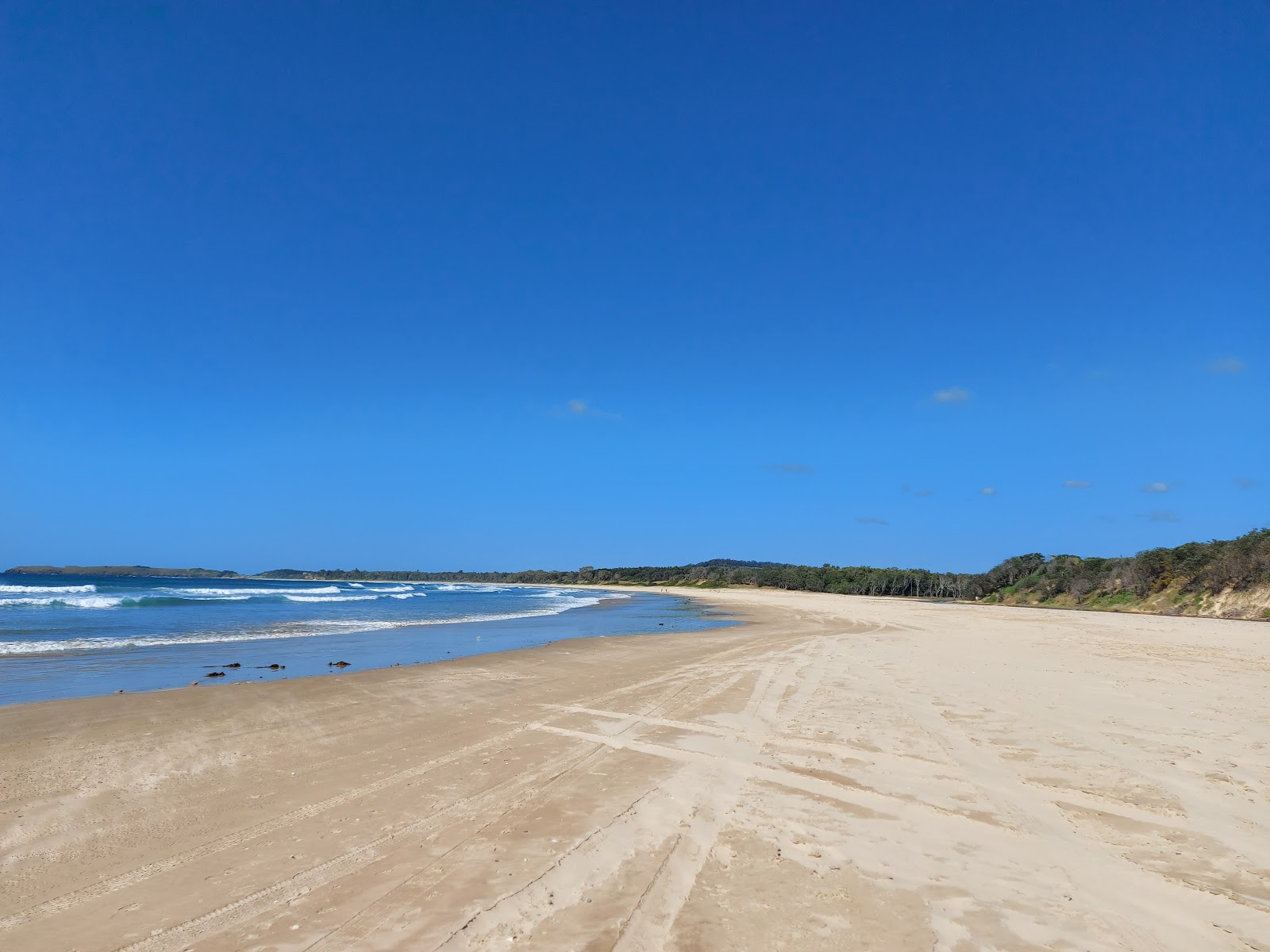 Photo of Woolgoolga Back Beach with very clean level of cleanliness