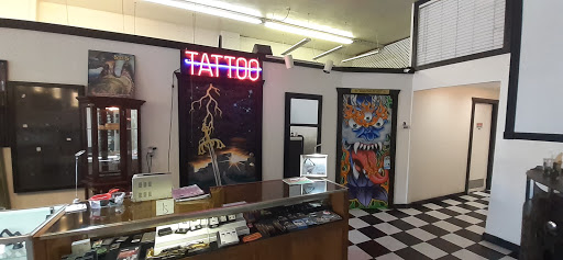 Explore celtic dragon tattoo ideas, creative tattoo ideas in Albuquerque, available at Sachs Body Modification