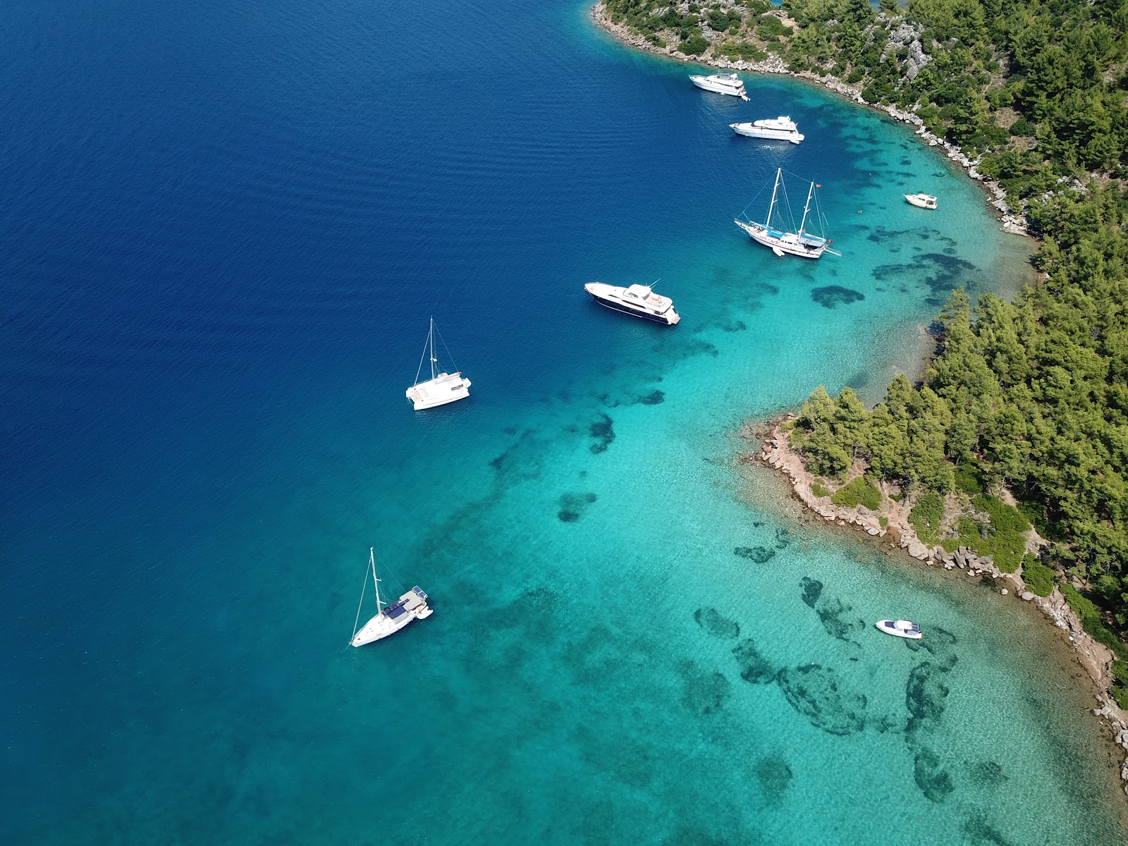 Photo of Cennet Koyu with turquoise pure water surface