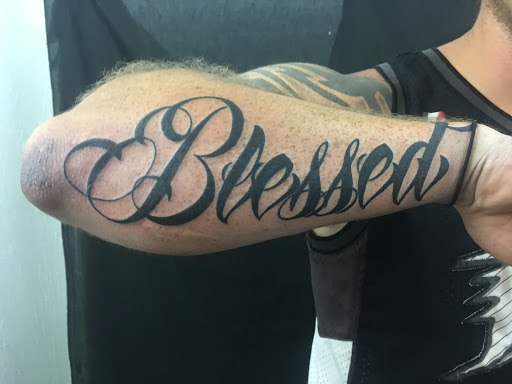 Explore shoulder tribal tattoo ideas, creative tattoo ideas in Kansas City, available at Waldos Darkside Tattoo
