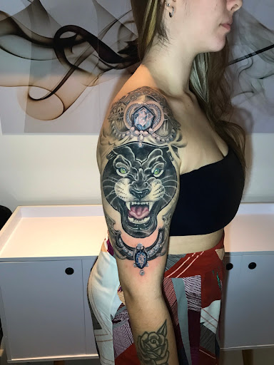 Logo da empresa - Isaac Tocinho Tattoo e Piercing