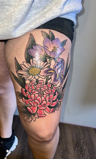 Explore medium tattoo ideas for men, creative tattoo ideas in Elkin, available at Black Bear Tattoo