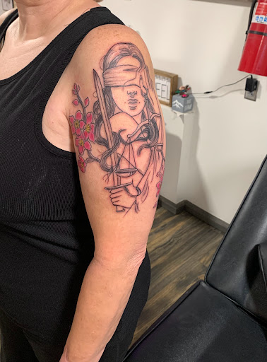 Explore manifest tattoo ideas, creative tattoo ideas in Florence, available at North Alabama Ink