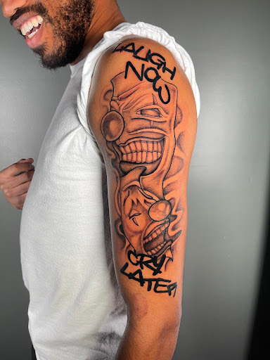 Explore tribal band tattoo ideas, creative tattoo ideas in Washington, available at Trilogy Atelier - DC Tattoo Shop Piercing Studio