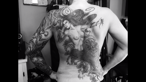 Explore fine line tattoo ideas for guys, creative tattoo ideas in Alfred, available at Utopian tattoo and body piercing