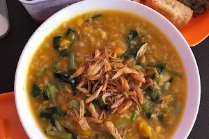 Warung bubur menado nasi kuning Mister image