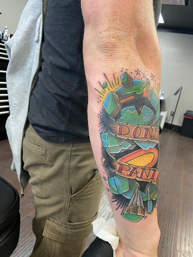 Explore tattoo ideas for mens thigh, creative tattoo ideas in Lake Charles, available at Creative Elements Tattoo Studio