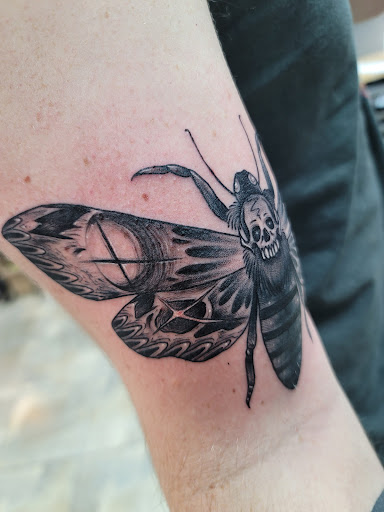 Explore tattoo ideas for book lovers, creative tattoo ideas in Yakima, available at Wallflower Body Piercing & Crazy Ink Tattoo