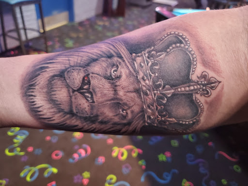 Explore hand tattoo ideas for woman, creative tattoo ideas in Deerfield, available at Maximum Tattoo