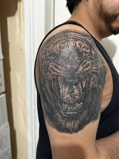 Find garter belt tattoo ideas for your next unique tattoo in Forest Hills at Noble Ink Tattoo Studio