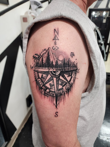 Explore country tattoo ideas for men, creative tattoo ideas in Decatur, available at Royal Spade Tattoo