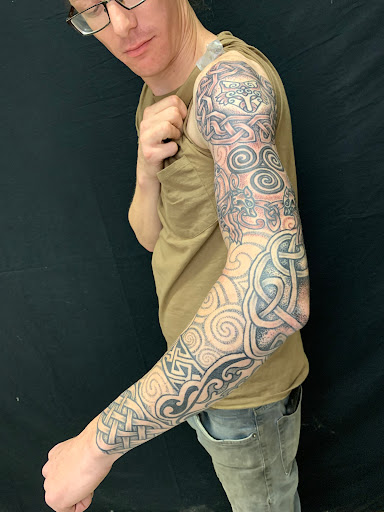 Explore donut tattoo ideas, creative tattoo ideas in Strasburg, available at Champion Tattoo Company