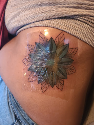 Explore curly hair tattoo ideas, creative tattoo ideas in Lake Alfred, available at Moreira Ink