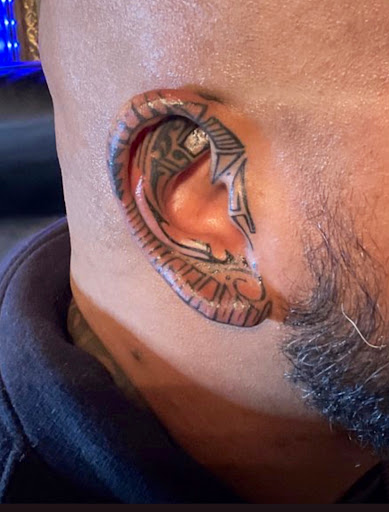 Explore name neck tattoo ideas, creative tattoo ideas in Fairfield, available at Tattoo Magic Good Fortunes Tattoo Studio And Art Gallery