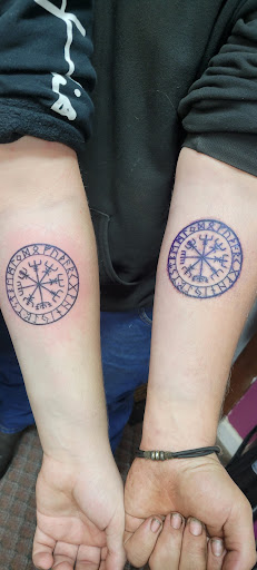 Explore dahlia tattoo ideas, creative tattoo ideas in Angola, available at Hoodlum Ink