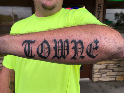 Explore tattoo ideas for fathers, creative tattoo ideas in Roscoe, available at Elevated Ink Tattoo