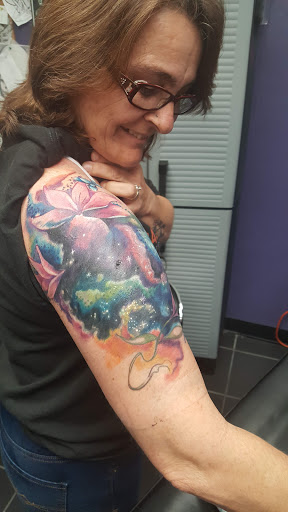 Explore galaxy tattoo ideas black and white, creative tattoo ideas in Greensboro, available at Tate Street Tattoo Co, LLC