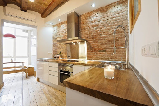 puertas automaticas Com - Instalación de Parquets, Diseño de cocinas, puertas y armarios en Castelldefels