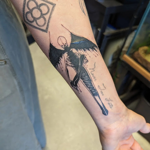 Explore brass knuckle tattoo ideas, creative tattoo ideas in Austin, available at Heath Studios & Tattoo