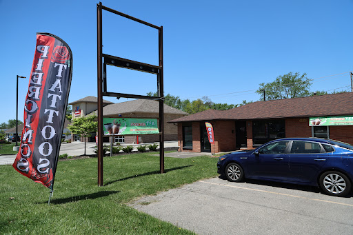 Explore family tattoo ideas for guys on arm, creative tattoo ideas in Muncie, available at Forbidden Fruit Tattoo and Piercing