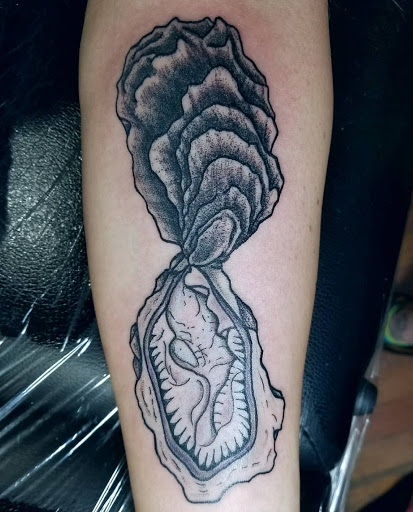 Find arm band tattoo ideas for your next unique tattoo in Fort Collins at Parabrahma Tattoo Collective