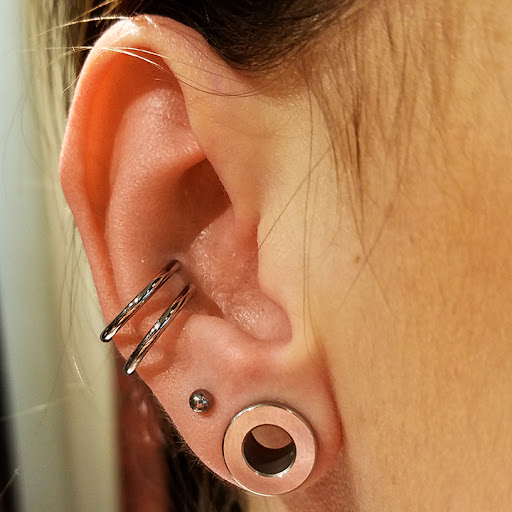 Explore neck tattoos for women ideas, creative tattoo ideas in Las Vegas, available at Club Tattoo The Venetian Grand Canal Shoppes