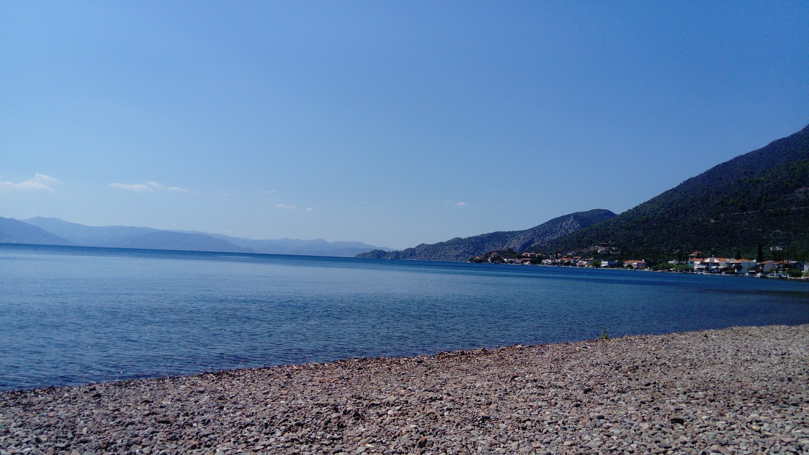 Fotografie cu Almyra beach cu o suprafață de apa pură turcoaz