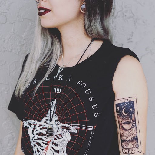 Find breast tattoo ideas for females for your next unique tattoo in Winter Park at Tim Lease Custom Tattoos