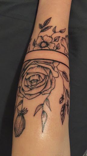 Explore angel tattoo ideas, creative tattoo ideas in Kearney, available at Ink Shop Tattoos & Piercings