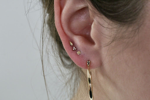 Explore half sleeve tattoos womens ideas, creative tattoo ideas in Omaha, available at Sushi Balloon Body Piercing