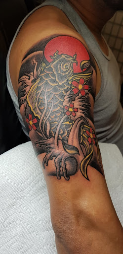 Explore flower name tattoo ideas, creative tattoo ideas in Hollywood, available at Major Ink Studios