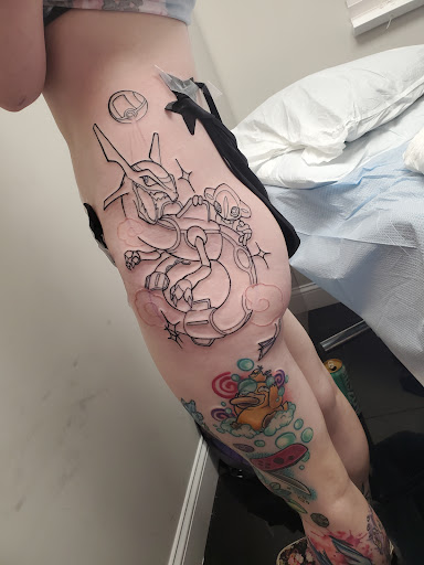 Explore simple flower tattoo ideas, creative tattoo ideas in West Babylon, available at Beacon Tattoo & Piercings