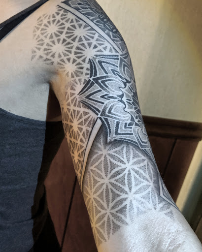 Explore mad hatter tattoo ideas, creative tattoo ideas in Pittsburgh, available at Dark Matter Tattoo Collective