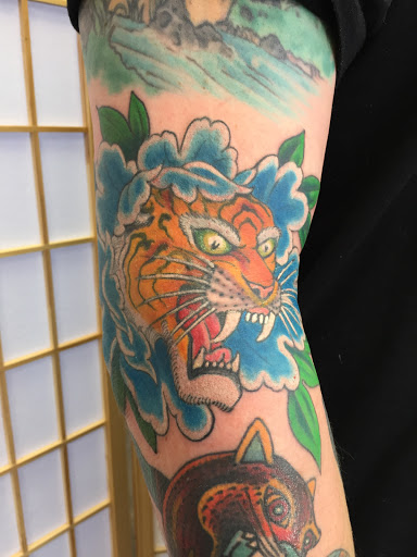 Explore sloth tattoo ideas, creative tattoo ideas in Richmond, available at Civilization Tattoo