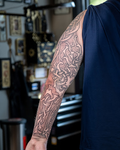 Explore tattoo ideas for mens leg, creative tattoo ideas in Vancouver, available at Hopeless Tattoo & Piercing