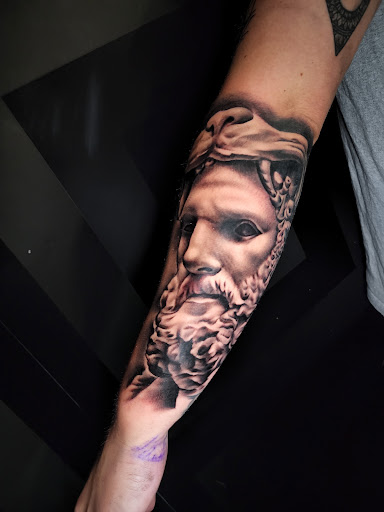 Explore hand mens tattoo ideas, creative tattoo ideas in Brentwood, available at Eleven Mag Tattoo