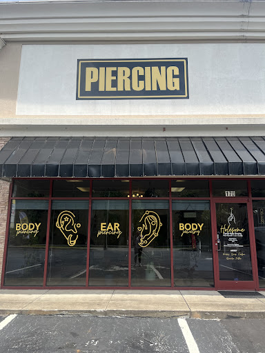 Explore knee scar tattoo ideas, creative tattoo ideas in Seneca, available at Holesome Family Body Piercing