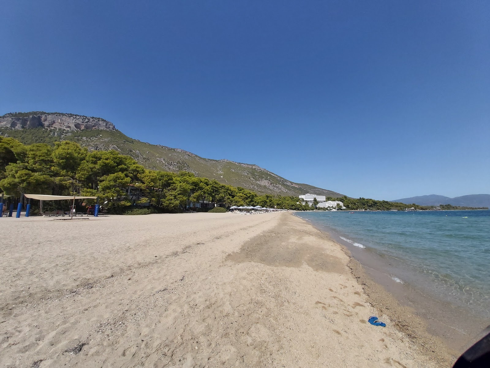 Foto van Gregolimano beach met turquoise puur water oppervlakte