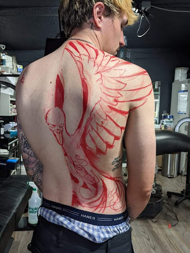 Find tattoo business card ideas for your next unique tattoo in Longmont at Sharkys Paradise