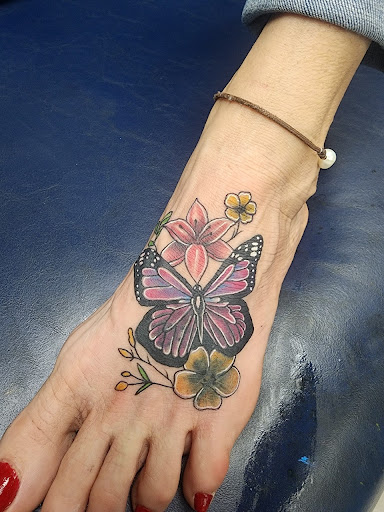 Explore daffodil tattoo ideas, creative tattoo ideas in Foley, available at Symbolic Ink Tattoo Studio