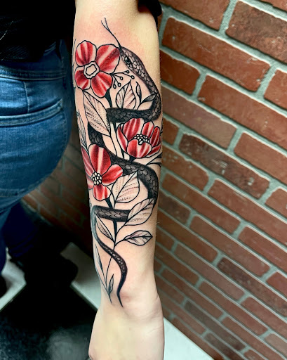 Explore long tattoo ideas, creative tattoo ideas in Toledo, available at Steel Addictions