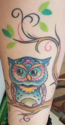 Explore back of the ear tattoo ideas, creative tattoo ideas in Omaha, available at Black Squirrel Omaha