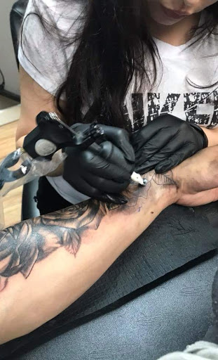 Explore dragonfly flower tattoo ideas, creative tattoo ideas in Houston, available at RS3 Studios
