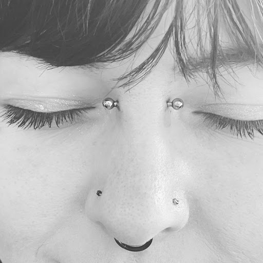 Find simple sun tattoo ideas for your next unique tattoo in Palm Harbor at Angry Owl Tattoo and Piercing