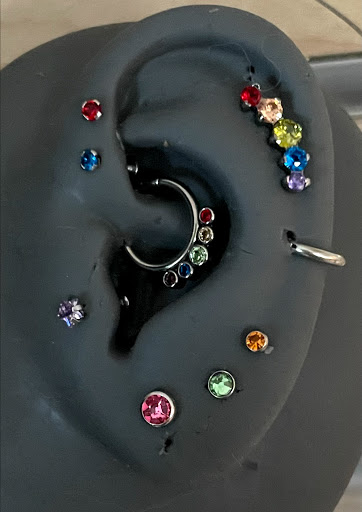 Explore neck tattoo men ideas, creative tattoo ideas in Kirksville, available at Properly Pierced