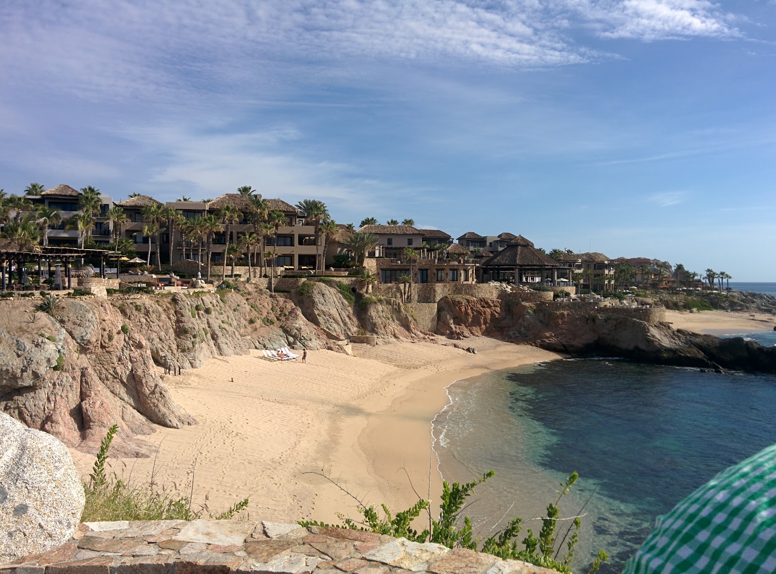 Valokuva Playa Cabo Bello IIIista. pinnalla kirkas hiekka:n kanssa