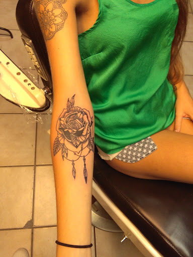 Explore womb tattoo ideas, creative tattoo ideas in Bradenton, available at Memory Lane Tattoo Co.