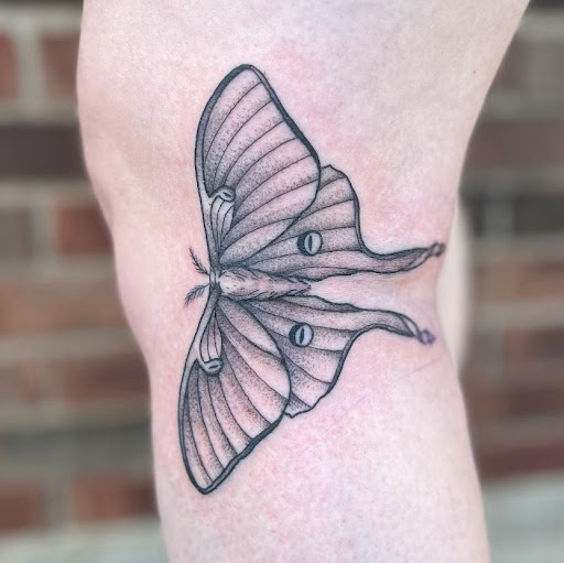 Explore knitting tattoo ideas, creative tattoo ideas in Madison, available at Lost Lakes Tattoo