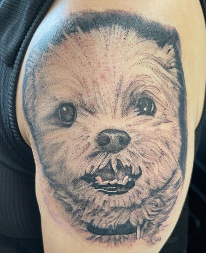 Explore tribal sun tattoo ideas, creative tattoo ideas in Lombard, available at New Hope Tattoo