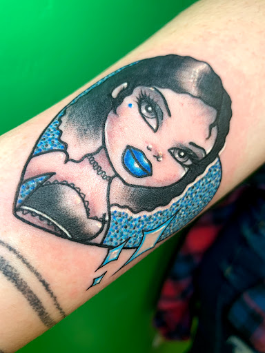 Explore new years tattoo ideas, creative tattoo ideas in Marietta, available at Lady Envy Tattoo